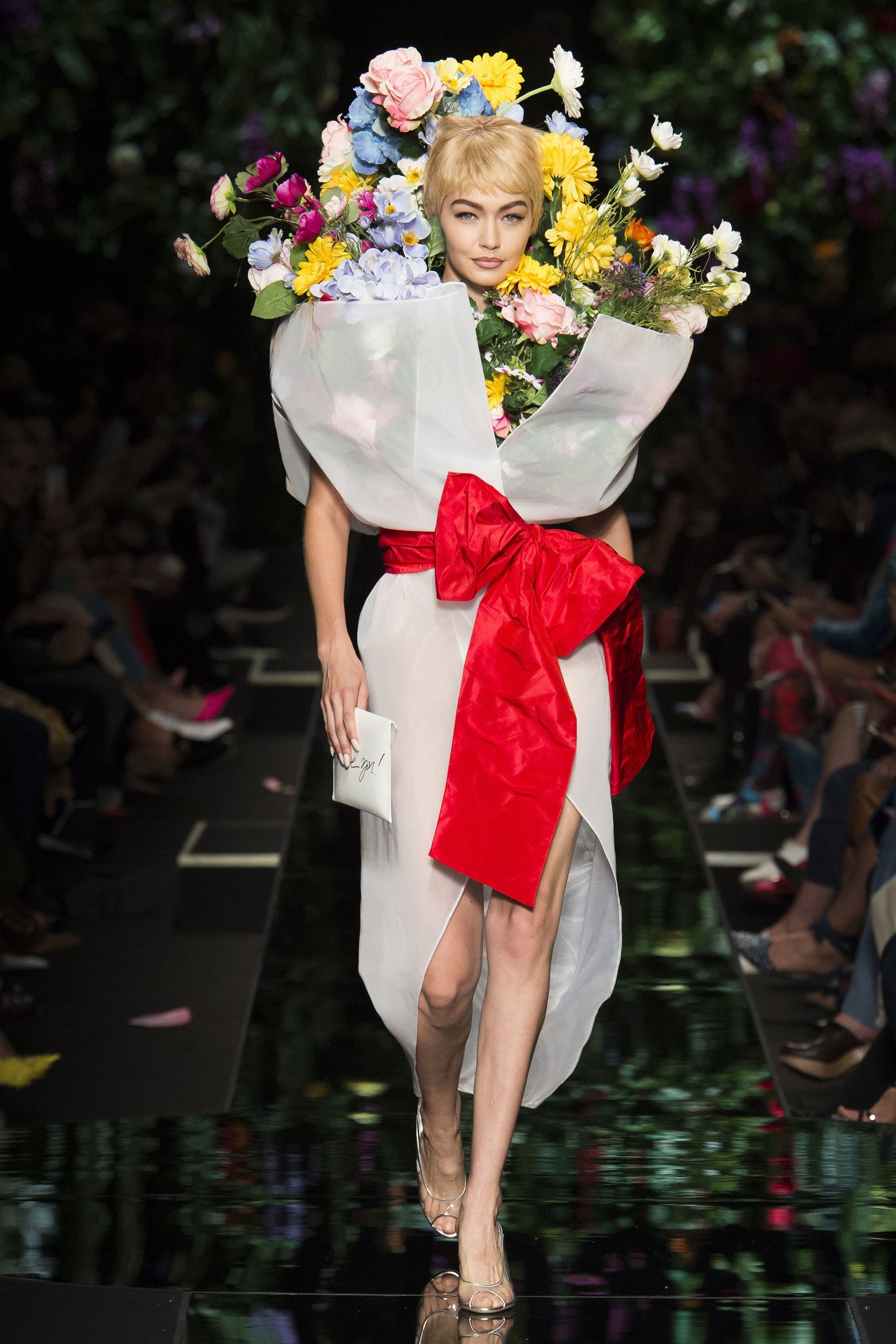 Gigi Hadid as a bodega bouquet at Moschino Spring 2018